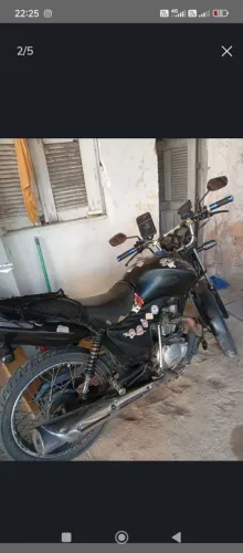 Moto Honda toda boa só roda
