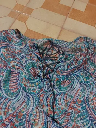 Blusa em tecido transparente