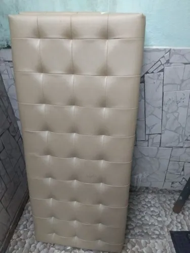 Cabeceira estofada