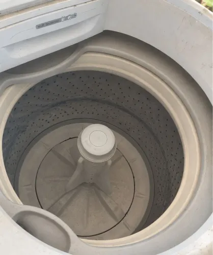 Máquina de lavar com defeito