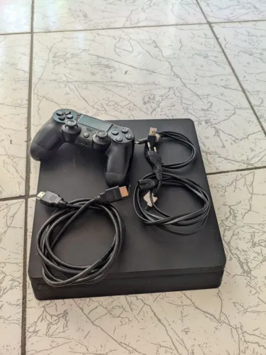 Vendo PS4 SLIM 1tb funcionando perfeitamente 