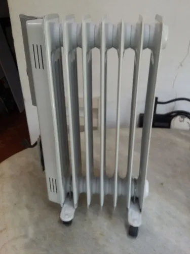 Aquecedor de Ambiente Elétrico 127V a Óleo Funcionando muito bem