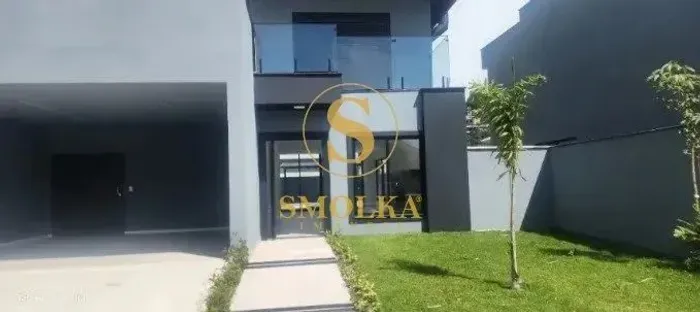 Casa em condomínio à venda com 5 suítes e 4 vagas de garagem em condomínio no bairro Cacho