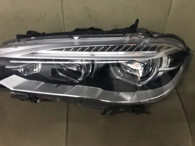 Bmw x farol lê completo original 
