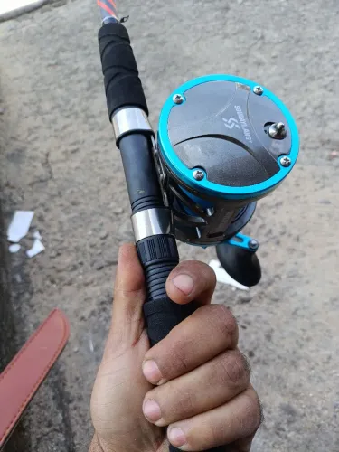 Carretilha e vara de pesca