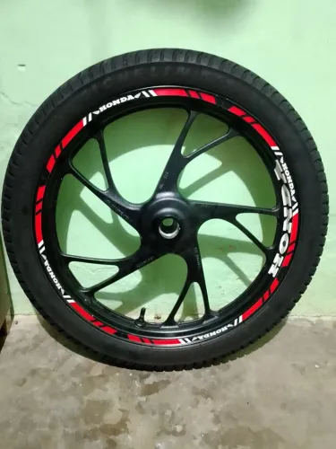 ? RODA DIANTEIRA HONDA COMPLETA + PNEU MICHELIN ?