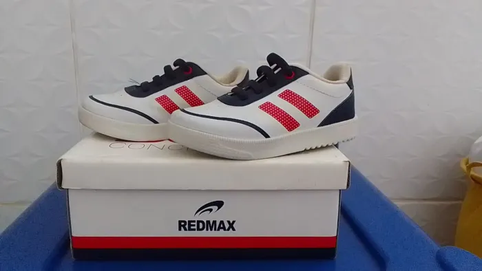 Chuteira infantil Redmax