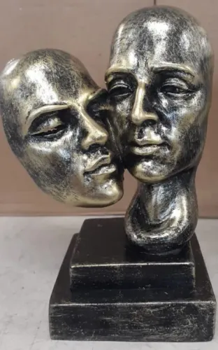 Escultura rosto... fica linda na estante...