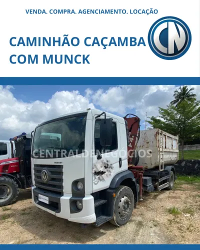 Caminhão caçamba com Munck