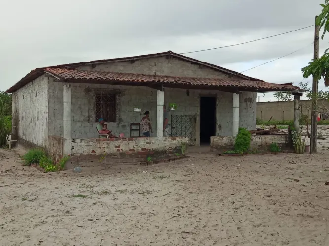 Terreno com casa
