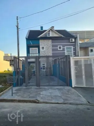 Casa à venda em Mário Quintana com 129 m², 4 quartos, 2 suítes, 2 vagas