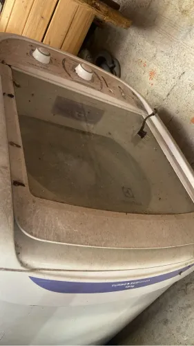 Máquina de lavar com defeito 