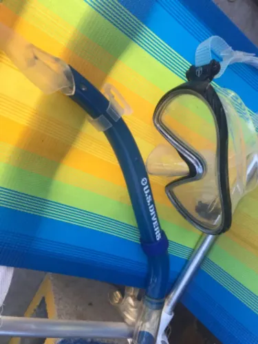 Oculos de mergulhador e snorkel