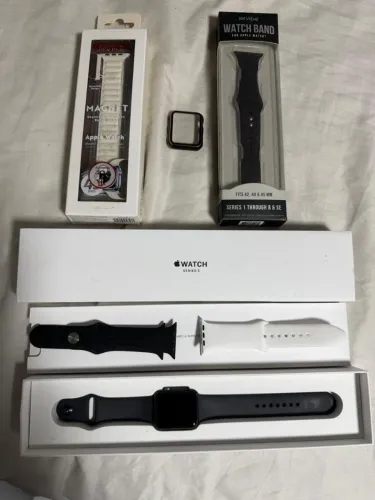 Relógio WatchApple Geração 3 na caixa, 4 pulseiras e um protetor de visor.