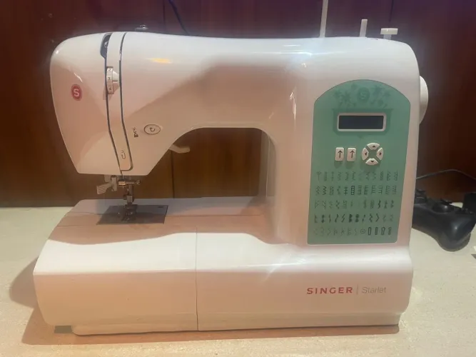 Máquina de costura singer
