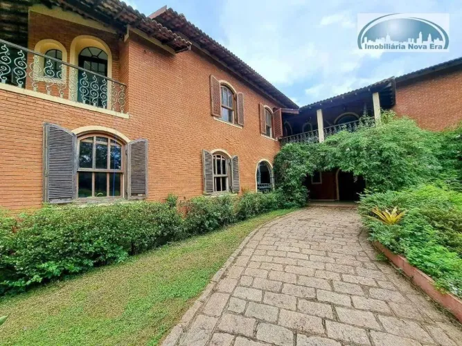 Casa com 5 dormitórios à venda, 577 m² por R$ 3.990.000,00 - Condomínio São Joaquim - Vinh
