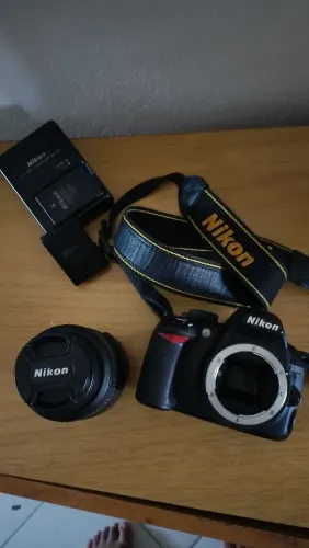 Câmera Nikon D3100 + Lente 18-55 + Strap + 2 baterías originais + Carregador