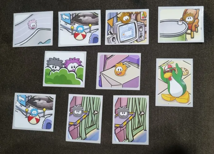 Figurinhas club penguin álbum puffles
