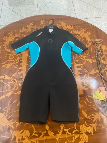 Roupa neoprene feminina surf short John tribord 