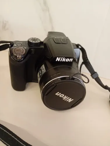 Câmera Nikon Coolpix P100 - Perfeito estado e funcionamento