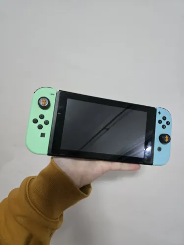 Nintendo Switch Versão Animal Crossing + 2 jogos + Case Zelda
