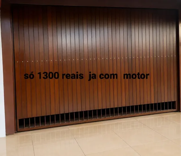 Portao de contra peso lindo em ótimo estado com motor