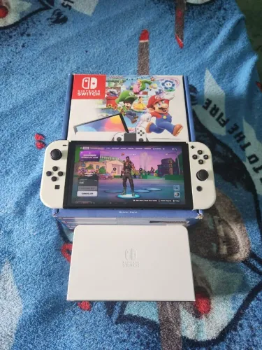 NITENDO SWITCH OLED 64GB COM NOTA FISCAL 4 MESES DE USO NA GARANTIA
