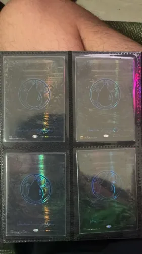 Set 4x Island (Phyrexian) - Full Art (Oil Slick Raised Foil)