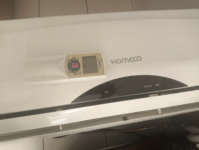 Ar condicionado Komeco 12000 BTUs ,com controle , usado em bom estado.