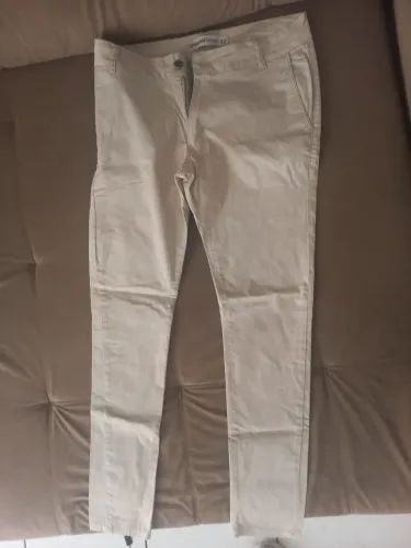 Calça skinny bege