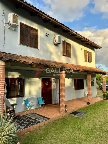 Casa à venda em Águas Claras - Viamão, com 6 quartos, piscina e amplo espaço de lazer