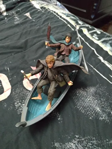 O Senhor dos anéis Sam e Frodo no barco