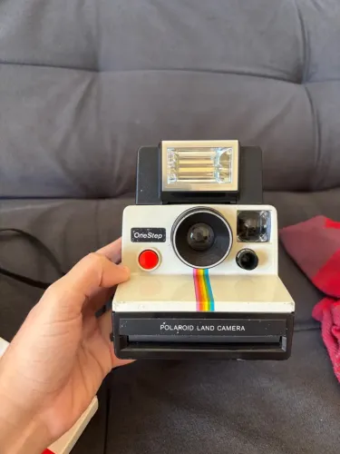 Câmera Polaroid OneStep com flash e filme