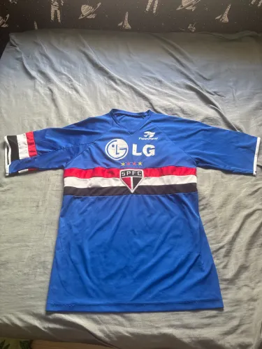Camiseta do São Paulo azul da topper dos anos 2000
