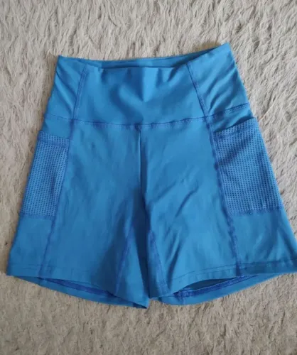 Lote de roupas de treino+bolsa.