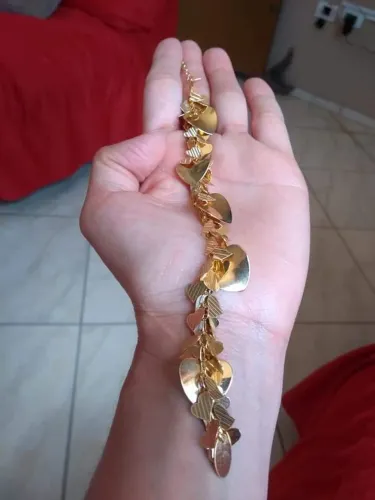 Pulseira de coração dourada