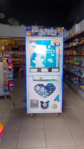 Vendo maquina de pegar ursinho 