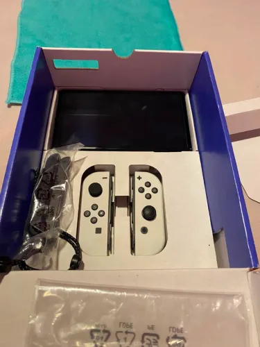 Nintendo Switch OLED 3 meses de uso. Estudo trocas por celular notebook e console.