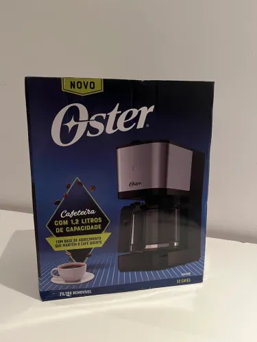 Cafeteira Oster INOX 1,2L 750W - 127V - Lacrada na caixa