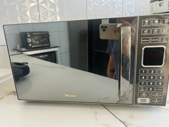 Vendo microondas motivo mudança no estado da foto retirar na nova Sepetiba