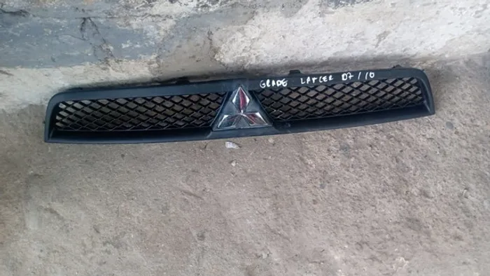 Grade frontal Mitsubishi Lancer 07 / 10