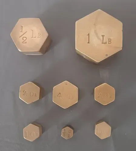 Conjunto c/ pesos em bronze p/ balança com medição em libras