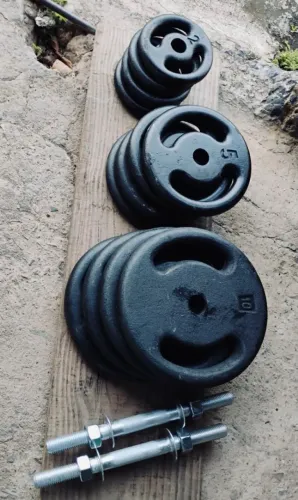 Kit 68 kg de Anilhas e duas barras maciças