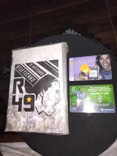 Dvd do Ronaldinho gaúcho e 2 relíquia do bruxo cartões telefônico. 
