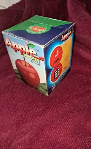 Vendo telefone novo em formato de maça na caixa