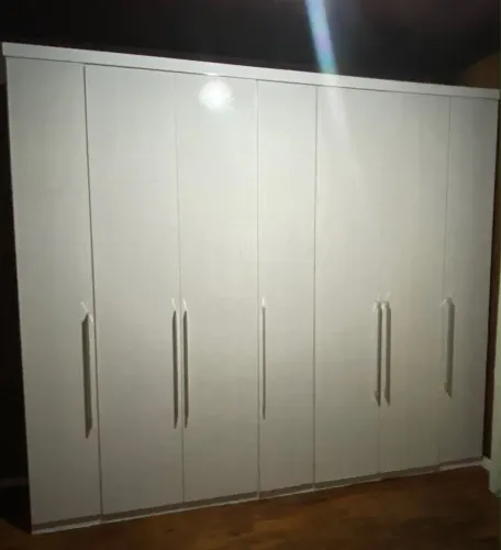 Guarda roupas 7 portas 4 gavetas