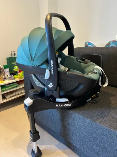 Bebê conforto Pebble 360 Maxi Cosi com base family fix 