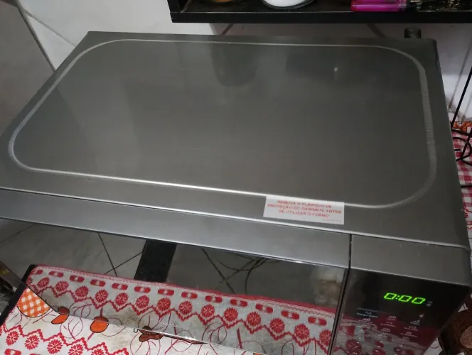 Microondas semi-novo, marca Midea.
