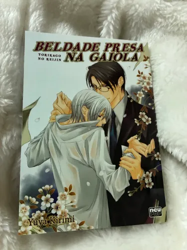 Beldade presa na gaiola mangá