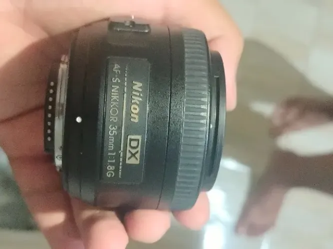 Nikon AF-S DX NIKKOR 35mm f/1.8G - Funcionando perfeitamente | Leve fungo